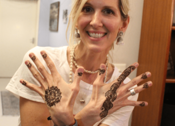 Ms. Stephanie Prall, Assistant, International Services & Service Learning at NMC, showing off her Mehendi designs