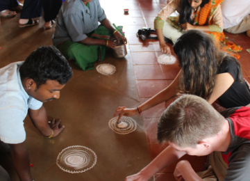 Day 4: Village Experience - Students learned how to make Rangoli art & pottery, play traditional village games, and participated in organic farming with village-folk on the outskirts of Bangalore.